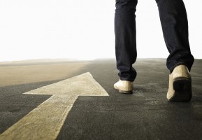 Picture of a man walking towards success