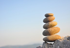 Picture of rocks balancing symbolizing mind body harmony.