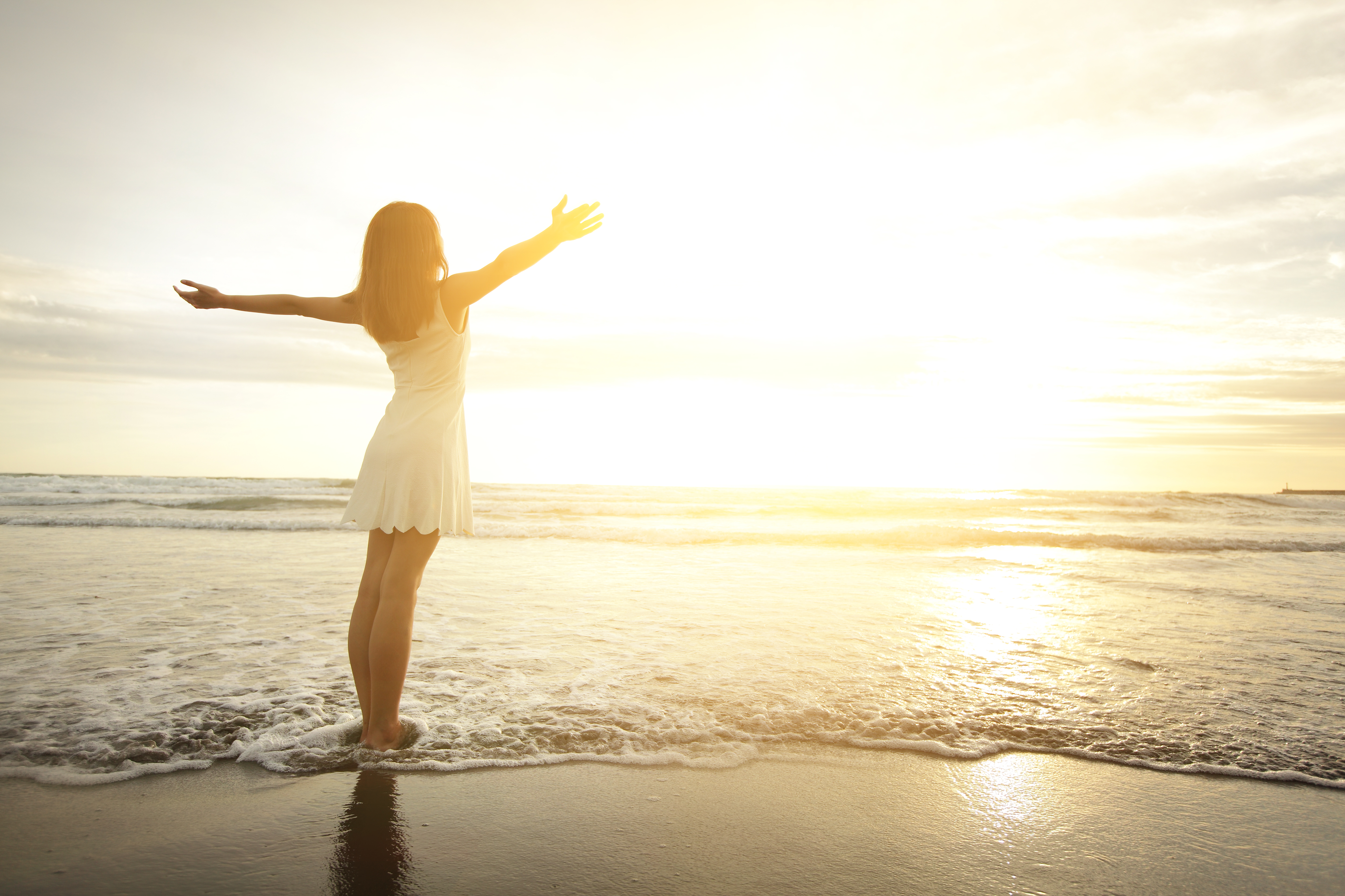 Picture of a happy woman releasing anxiety