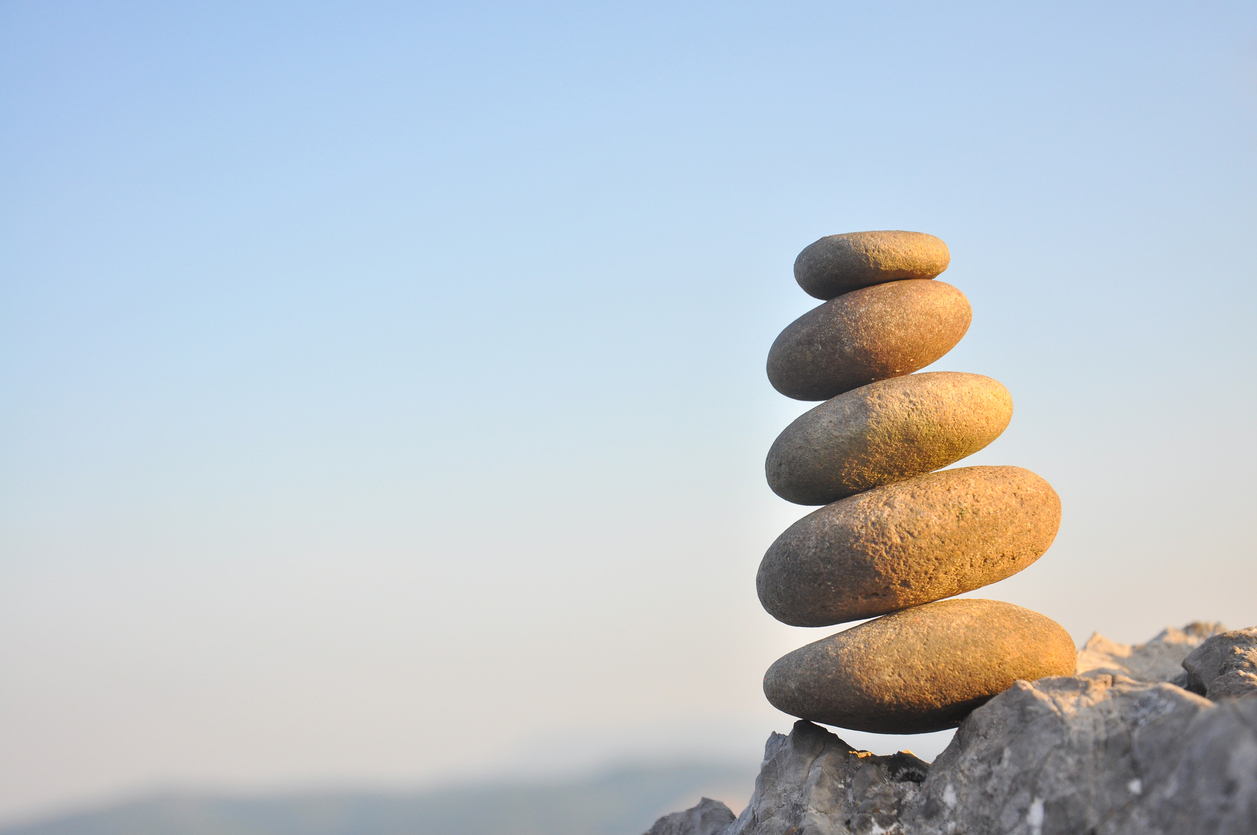 Picture of rocks balancing symbolizing mind body harmony.
